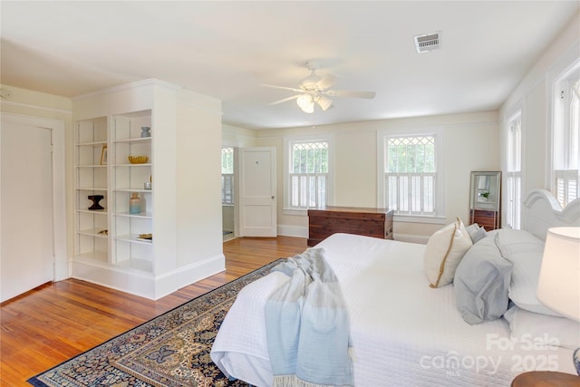 156 Union St N, Concord, NC 28025 - bedroom with wood finished floors and a ceiling fan