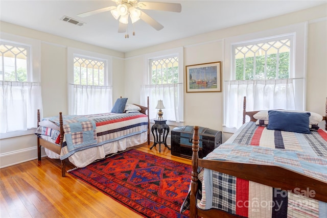 156 Union St N, Concord, NC 28025 - bedroom with wood finished floors and a ceiling fan