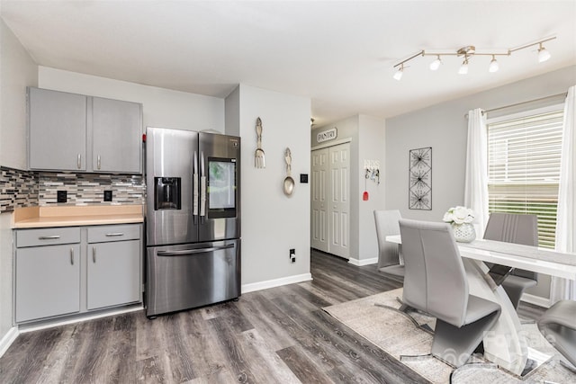 3542 Crowders View Dr, Gastonia, NC 28052 - kitchen featuring stainless steel fridge with ice dispenser, gray cabinets, dark wood-style flooring, and plenty of natural light