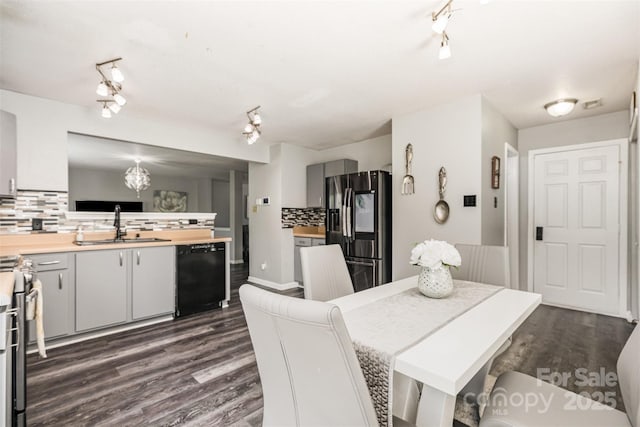 3542 Crowders View Dr, Gastonia, NC 28052 - dining room featuring dark wood-style flooring and track lighting
