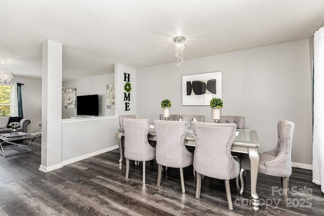 3542 Crowders View Dr, Gastonia, NC 28052 - dining space featuring dark wood-type flooring and a chandelier