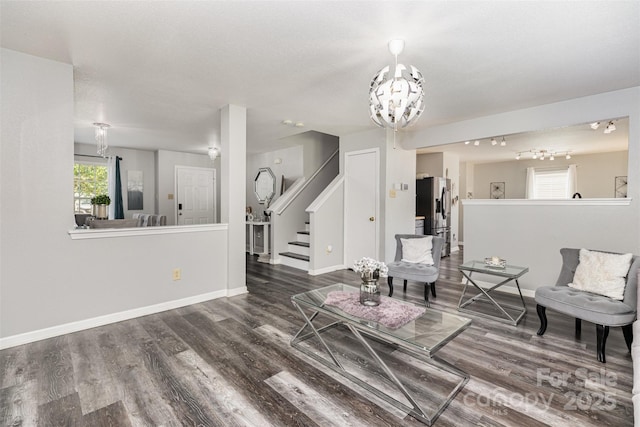 3542 Crowders View Dr, Gastonia, NC 28052 - living area with a chandelier, stairs, and wood finished floors