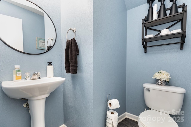 3542 Crowders View Dr, Gastonia, NC 28052 - half bathroom with toilet and wood finished floors