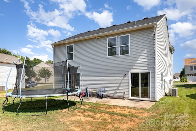 3542 Crowders View Dr, Gastonia, NC 28052 - back of house featuring a trampoline, a patio, and a lawn