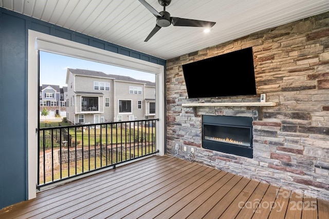 932 Portrush Ln, Tega Cay, SC 29708 - deck with a stone fireplace and a ceiling fan