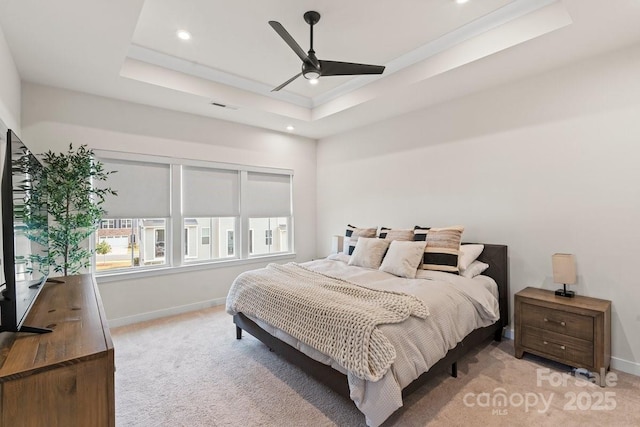 932 Portrush Ln, Tega Cay, SC 29708 - bedroom with light colored carpet, recessed lighting, a raised ceiling, and ceiling fan