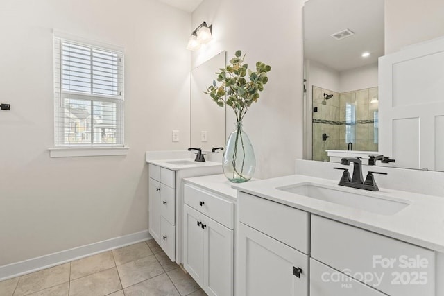 932 Portrush Ln, Tega Cay, SC 29708 - full bathroom with tiled shower, two vanities, tile patterned floors, and recessed lighting