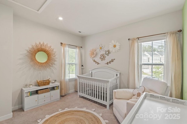 932 Portrush Ln, Tega Cay, SC 29708 - carpeted bedroom featuring a nursery area and recessed lighting