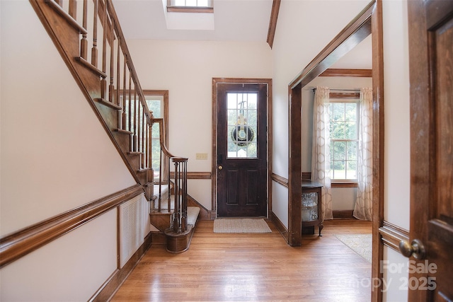 1482 Willow Oaks Trl, Matthews, NC 28104 - foyer featuring light wood-type flooring and stairs