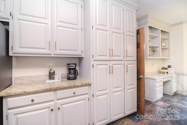 1482 Willow Oaks Trl, Matthews, NC 28104 - kitchen featuring dark stone finish floors, white cabinets, open shelves, and an office area