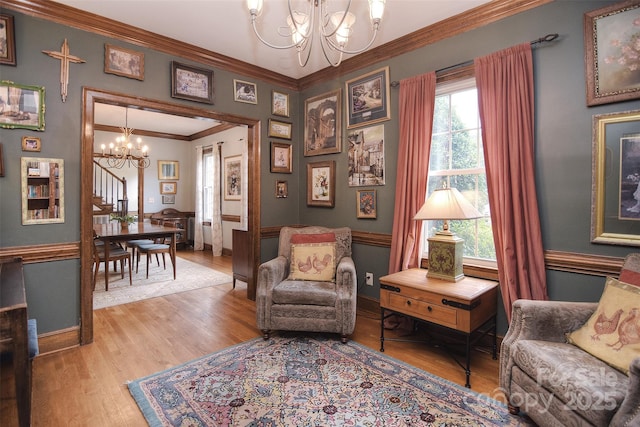 1482 Willow Oaks Trl, Matthews, NC 28104 - living area with a chandelier, light wood-type flooring, and ornamental molding