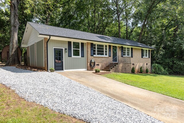 1948 Marett Blvd, Rock Hill, SC 29732 - ranch-style home featuring crawl space, a front yard, brick siding, a shingled roof, and driveway