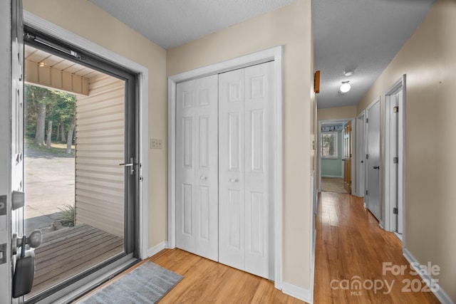 840 Deer Lake Run, Salisbury, NC 28146 - foyer entrance with wood finished floors and a textured ceiling