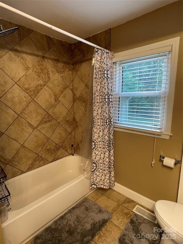 517 Stowe Dr, Lowell, NC 28098 - full bath with tile patterned floors and shower / bath combo