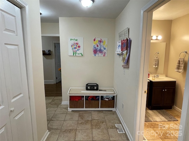 517 Stowe Dr, Lowell, NC 28098 - hall featuring light tile patterned floors and baseboards