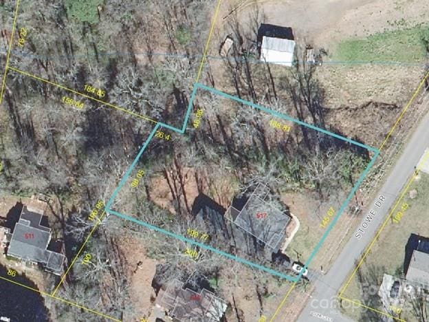 517 Stowe Dr, Lowell, NC 28098 - aerial map of property and surrounding area featuring property boundaries highlighted