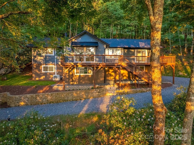 1065 Oak Ridge Ln, Mars Hill, NC 28754 - view of front of house with a deck, stairway, and a view of trees