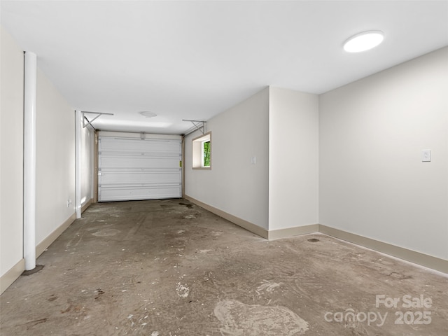 1065 Oak Ridge Ln, Mars Hill, NC 28754 - garage featuring baseboards