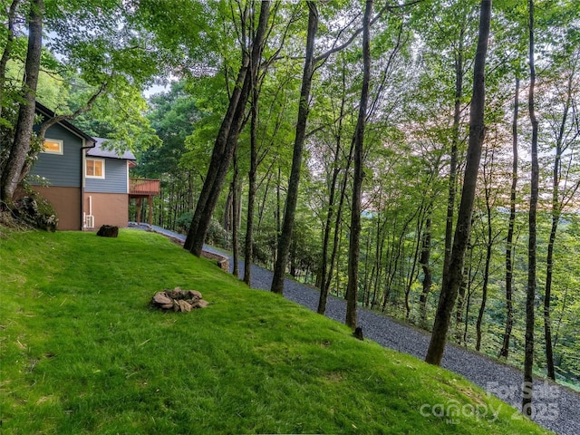 1065 Oak Ridge Ln, Mars Hill, NC 28754 - view of green lawn with a wooden deck