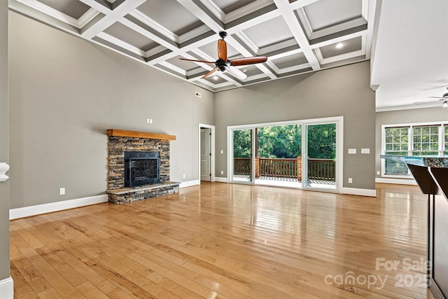 3450 4th Street Blvd NW, Hickory, NC 28601 - unfurnished living room with ceiling fan, a high ceiling, coffered ceiling, beam ceiling, and hardwood / wood-style floors