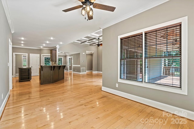 3450 4th Street Blvd NW, Hickory, NC 28601 - unfurnished living room featuring a ceiling fan, crown molding, recessed lighting, coffered ceiling, and decorative columns