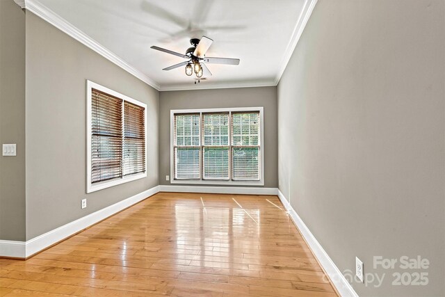 3450 4th Street Blvd NW, Hickory, NC 28601 - spare room with ornamental molding, light wood-style floors, and a ceiling fan