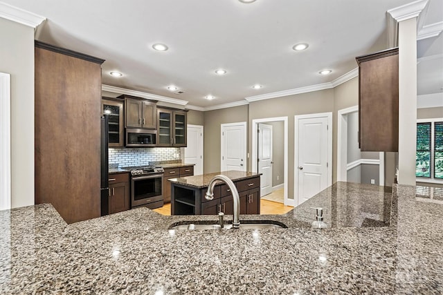 3450 4th Street Blvd NW, Hickory, NC 28601 - kitchen featuring appliances with stainless steel finishes, dark stone counters, crown molding, recessed lighting, and glass insert cabinets