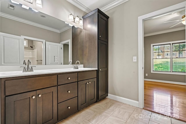 3450 4th Street Blvd NW, Hickory, NC 28601 - bathroom with double vanity, ornamental molding, a ceiling fan, and tile patterned floors