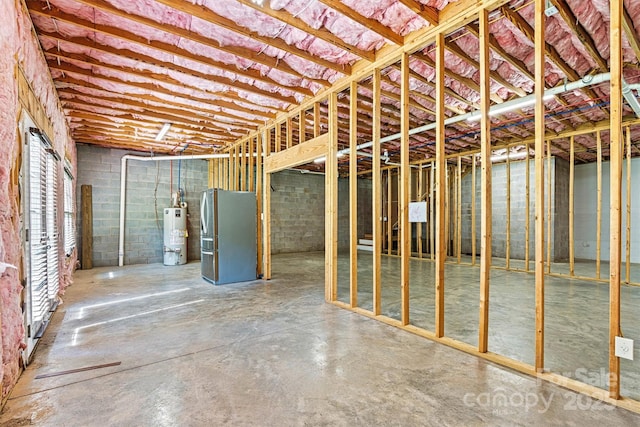 3450 4th Street Blvd NW, Hickory, NC 28601 - below grade area with freestanding refrigerator, water heater, and concrete block wall
