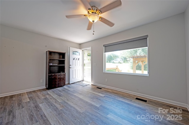 418 Stokes Ave, Clover, SC 29710 - empty room with wood finished floors and ceiling fan