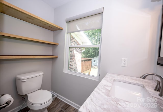 418 Stokes Ave, Clover, SC 29710 - half bathroom featuring wood finished floors and vanity