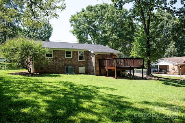 418 Stokes Ave, Clover, SC 29710 - rear view of property featuring a deck, brick siding, and a lawn