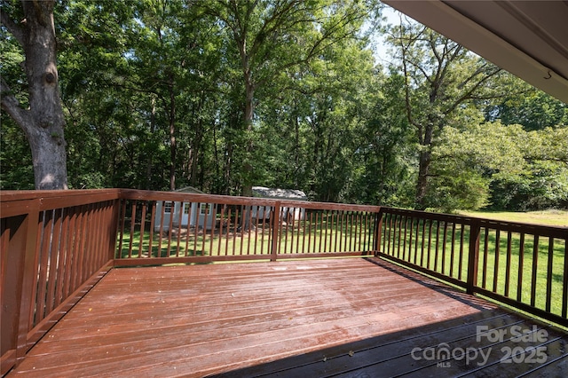 418 Stokes Ave, Clover, SC 29710 - wooden deck with a lawn