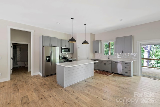 939 Rocky Mountain Rd, Lake Toxaway, NC 28747 - kitchen featuring stainless steel appliances, gray cabinets, decorative backsplash, light countertops, and recessed lighting