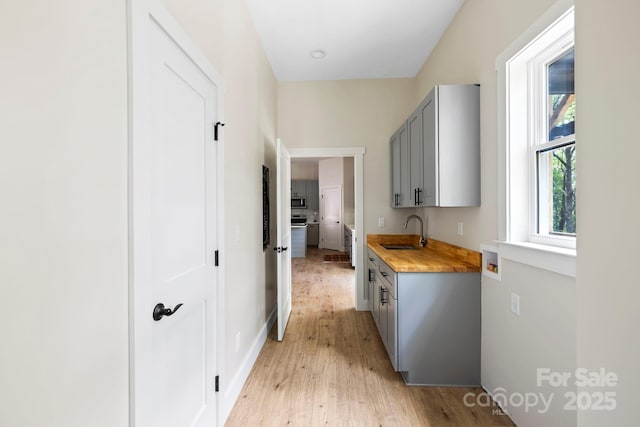 939 Rocky Mountain Rd, Lake Toxaway, NC 28747 - hall featuring a sink and light wood finished floors