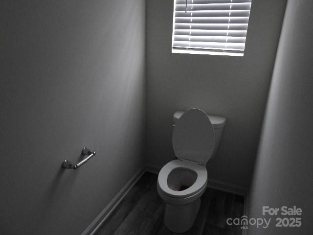 248 Mills Ave, Troutman, NC 28166 - bathroom with toilet and wood finished floors
