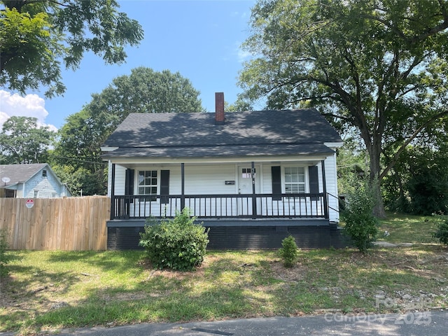 518 W White St, Chester, SC 29706 - view of front facade featuring a porch and a chimney