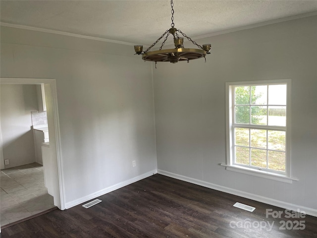518 W White St, Chester, SC 29706 - unfurnished dining area featuring a chandelier, dark wood-style floors, and crown molding