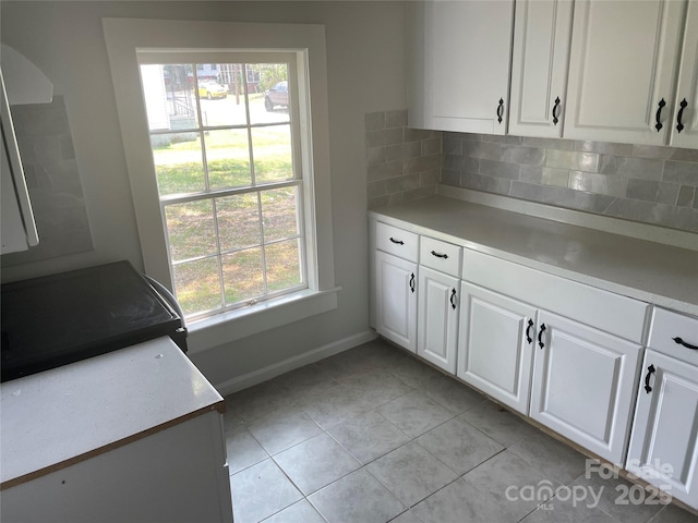 518 W White St, Chester, SC 29706 - kitchen with light countertops, healthy amount of natural light, and white cabinetry