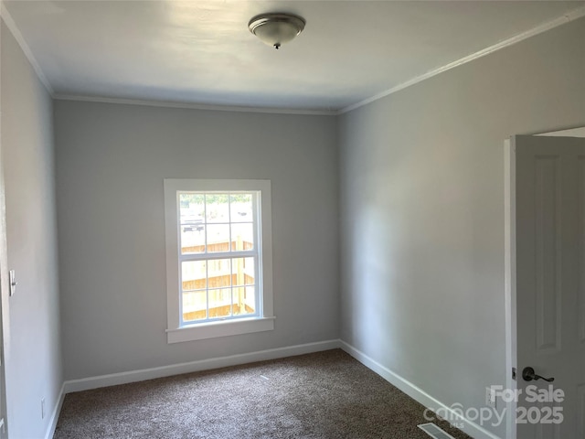 518 W White St, Chester, SC 29706 - spare room featuring dark carpet and crown molding