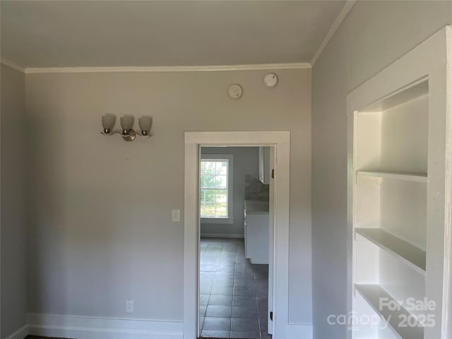 518 W White St, Chester, SC 29706 - corridor featuring crown molding, tile patterned floors, and built in shelves