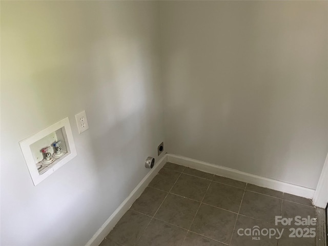 518 W White St, Chester, SC 29706 - washroom with dark tile patterned floors, hookup for a washing machine, and hookup for an electric dryer