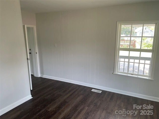 518 W White St, Chester, SC 29706 - spare room with dark wood-style floors