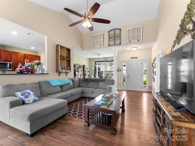 144 Haw River Rd, Fletcher, NC 28732 - living area with dark wood-type flooring, a ceiling fan, high vaulted ceiling, and recessed lighting