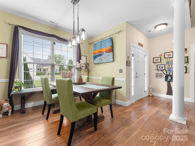 144 Haw River Rd, Fletcher, NC 28732 - dining room with ornate columns and light wood finished floors