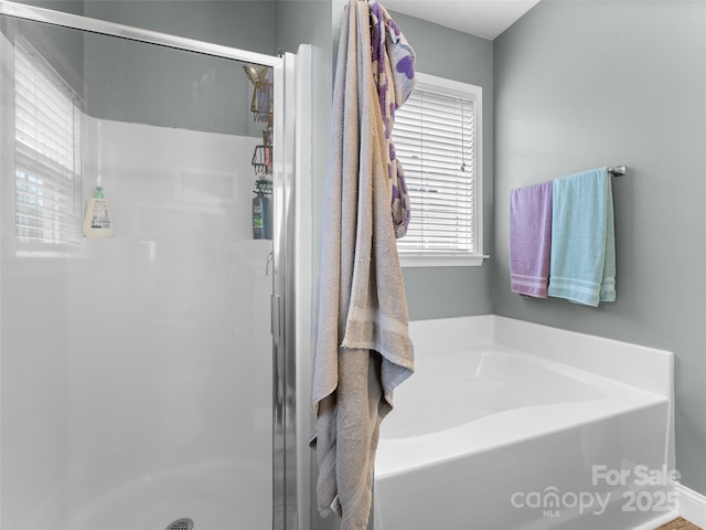 144 Haw River Rd, Fletcher, NC 28732 - bathroom featuring a shower stall and a bath