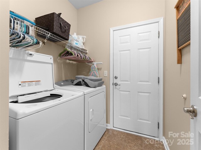 144 Haw River Rd, Fletcher, NC 28732 - laundry area featuring washer and clothes dryer and baseboards
