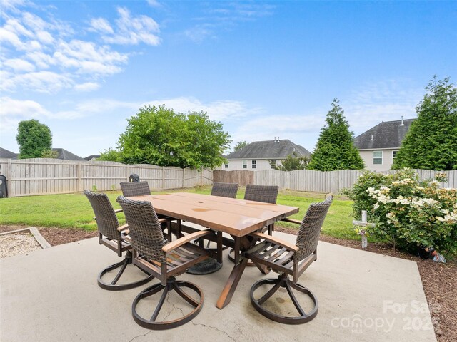 144 Haw River Rd, Fletcher, NC 28732 - fenced backyard with outdoor dining space and a patio