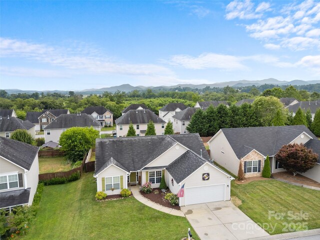 144 Haw River Rd, Fletcher, NC 28732 - aerial view of residential area with a mountainous background