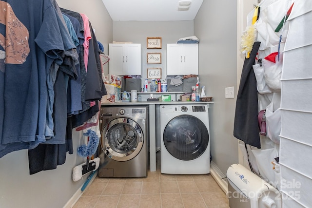 217 Fielding St, Mount Holly, NC 28120 - laundry area with independent washer and dryer, cabinet space, and tile patterned floors
